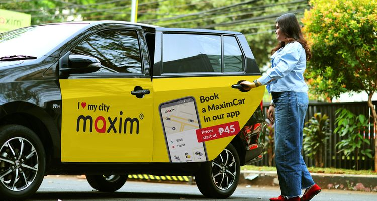 Maxim car with a Prices start at ₱45 sign