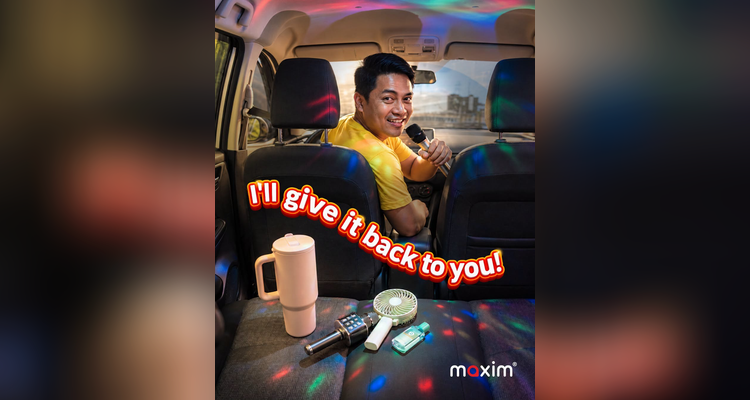 Maxim driver in a car with items left on the back seat